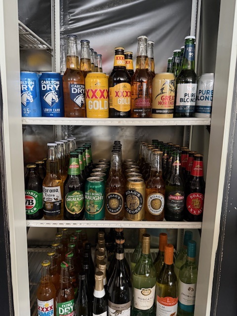 Close-up of the beer fridge packed with Carlton, Boags and XXXX stubbies